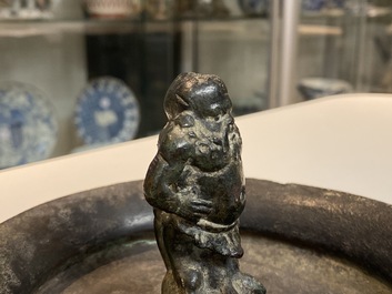 Een Romeinse bronzen 'sater' kom, wellicht 3/6e eeuw