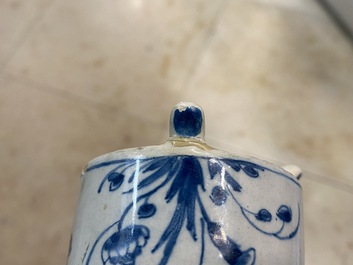 A Dutch Delft blue and white tripod caster with birds near blossoms, 1st half 18th C.