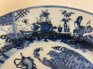 A finely painted and thin-walled large Dutch Delft blue and white chinoiserie dish, late 17th C.