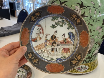 A pair of Chinese famille rose plates with ladies playing music, Yongzheng