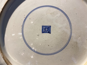 A pair of Chinese famille verte 'mythical animals' dishes, seal marks, Kangxi