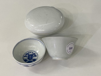 A Chinese white-glazed bowl, a small blue and white bowl and a covered box with incised design, Ming and Qing