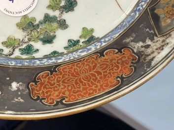 A pair of Chinese famille rose plates with ladies playing music, Yongzheng