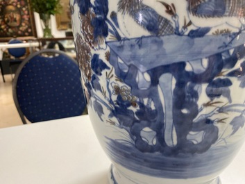 A Chinese blue, white and copper-red vase, 18/19th C.