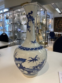 A rare Chinese blue and white bottle vase with a tiger and two butterflies, Transitional period