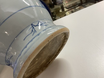A Chinese blue, white and copper-red vase, 18/19th C.