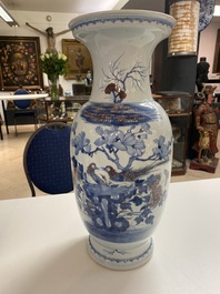 A Chinese blue, white and copper-red vase, 18/19th C.