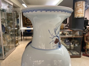 A Chinese blue, white and copper-red vase, 18/19th C.