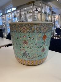 A Chinese famille rose turquoise-ground 'bajixiang' jardini&egrave;re, 19th C.
