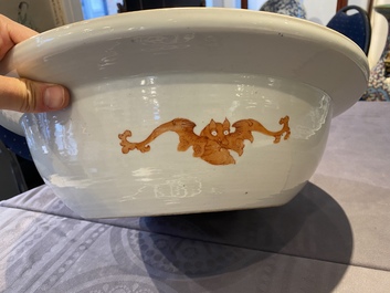 A large Chinese blue and white dish and a floral bowl, 19th C.