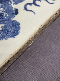 A large Chinese blue and white 'Buddhist lions' plaque, 19th C.