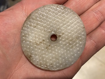 A Chinese white jade bi disc, Han