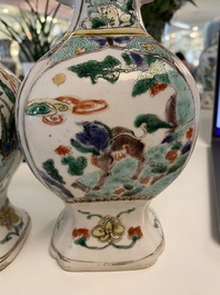 A Chinese famille verte four-piece 'mythical animals' garniture, Kangxi