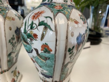 A Chinese famille verte four-piece 'mythical animals' garniture, Kangxi