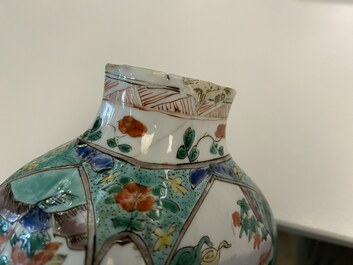 A Chinese famille verte four-piece 'mythical animals' garniture, Kangxi