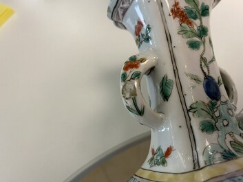 A Chinese famille verte four-piece 'mythical animals' garniture, Kangxi