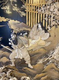 A large Japanese wooden screen with a central gilt-lacquered and ivory-inlaid panel, Meiji