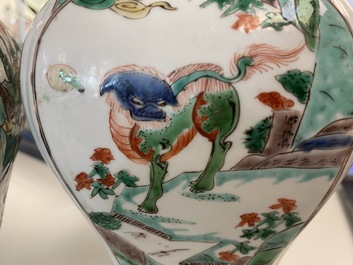 A Chinese famille verte four-piece 'mythical animals' garniture, Kangxi