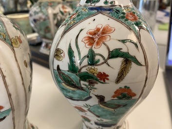 A Chinese famille verte four-piece 'mythical animals' garniture, Kangxi
