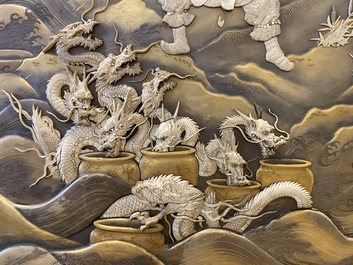 A large Japanese wooden screen with a central gilt-lacquered and ivory-inlaid panel, Meiji