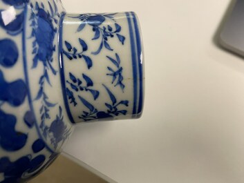 A Chinese blue and white four-piece garniture, Kangxi mark, 19th C.