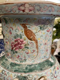 A Chinese famille rose turquoise-ground vase, 19th C.