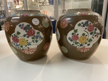 A pair of Chinese famille rose capucin brown-ground jars, Qianlong