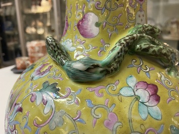 A Chinese yellow-ground famille rose bottle vase, 19th C.