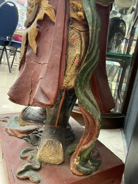 A large polychromed wooden figure of a guardian, China or Vietnam, 19th C.