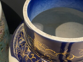 A Chinese blue-ground famille rose vase and cover, Kangxi mark, 19th C.