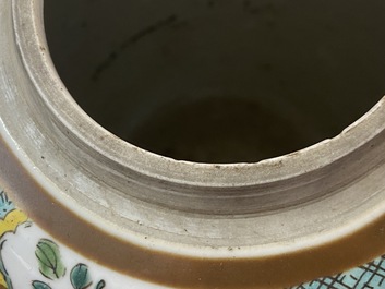 A pair of Chinese famille rose capucin brown-ground jars, Qianlong