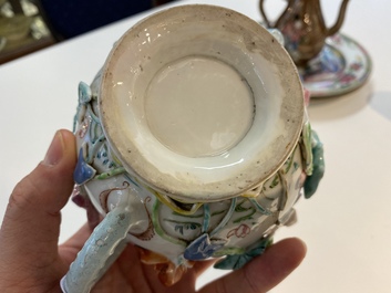 A Chinese famille rose teapot with applied floral design, Yongzheng