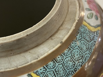 A pair of Chinese famille rose capucin brown-ground jars, Qianlong