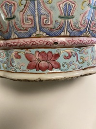 A Chinese famille rose turquoise-ground vase, 19th C.