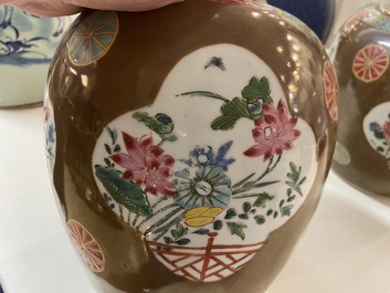 A pair of Chinese famille rose capucin brown-ground jars, Qianlong