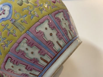 A Chinese yellow-ground famille rose bottle vase, 19th C.