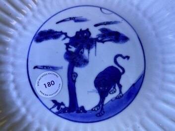A Chinese blue and white chysanthemum-moulded ko-sometsuke 'tiger' dish for the Japanese market, Tianqi/Chongzhen