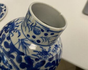 A Chinese blue and white four-piece garniture, Kangxi mark, 19th C.