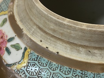 A pair of Chinese famille rose capucin brown-ground jars, Qianlong