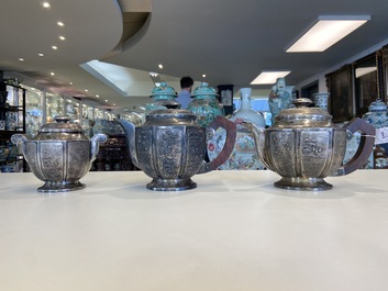 Two Vietnamese silver teapots and a sugar bowl and cover, marked Donghung, ca. 1900