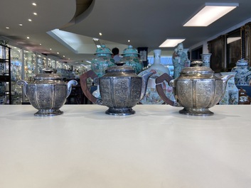 Two Vietnamese silver teapots and a sugar bowl and cover, marked Donghung, ca. 1900