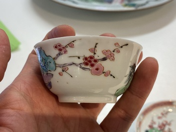 A Chinese famille rose cup and saucer with a couple on a terrace, Qianlong