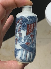 Five Chinese blue, white and copper-red snuff bottles, 18/20th C.