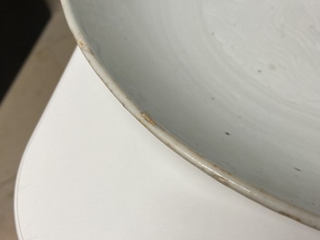 A Chinese monochrome white dish with incised double phoenix design, Jiajing mark, Ming