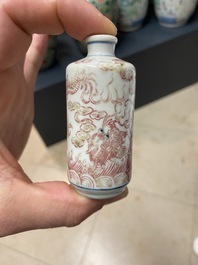 Five Chinese blue, white and copper-red snuff bottles, 18/20th C.