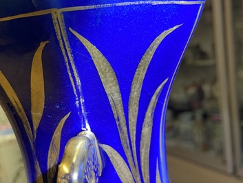 A pair of Chinese gilt-decorated monochrome blue vases, Qianlong