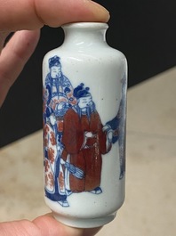 Five Chinese blue, white and copper-red snuff bottles, 18/20th C.
