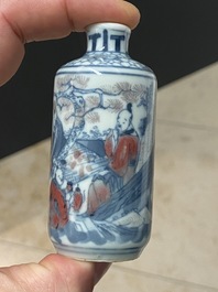 Five Chinese blue, white and copper-red snuff bottles, 18/20th C.