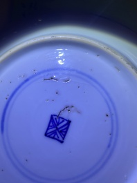 A Chinese blue and white covered cup and saucer for the French market, Kangxi