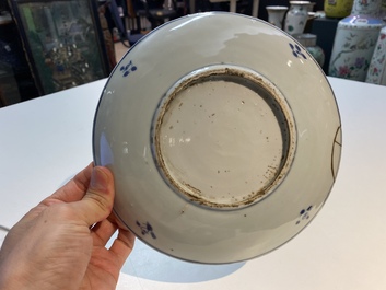 A Chinese blue, white and copper red ko-sometsuke 'fish' plate for the Japanese market, Transitional period